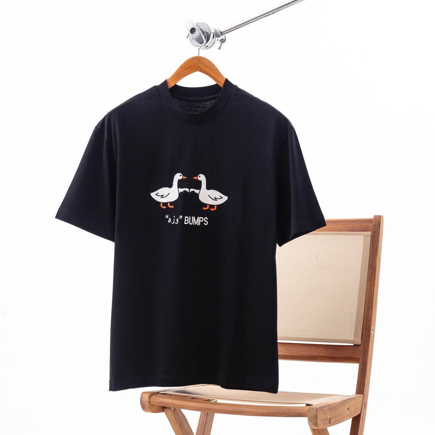 The وزه Bumps Tee